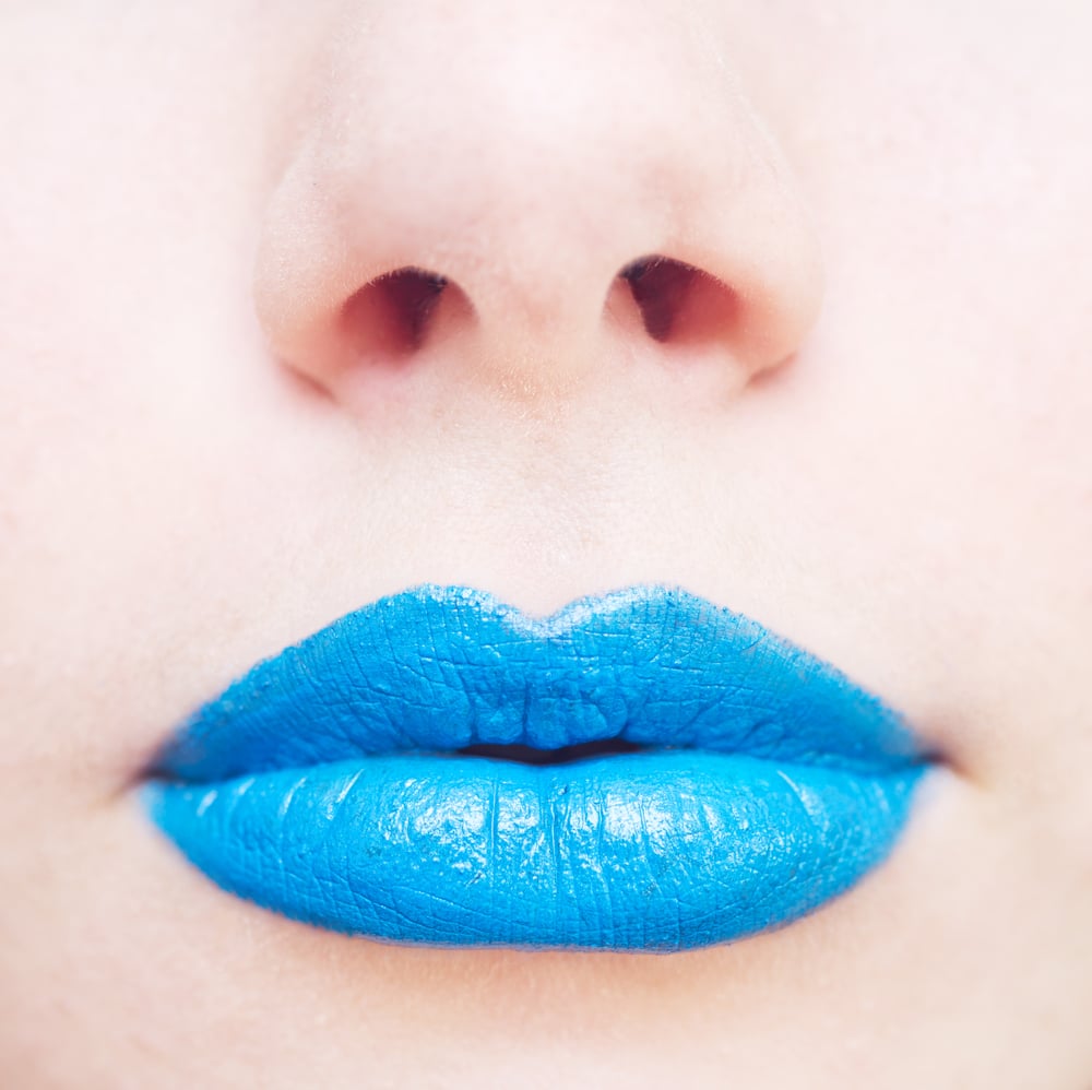Swadlincote dentists don blue lips to raise awareness of mouth cancer