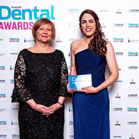 Inverness dentist smiling from ear to ear after being crowned Scotland’s Young Dentist of the Year