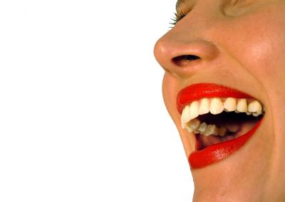 Dannii Minogue laughs at massive teeth