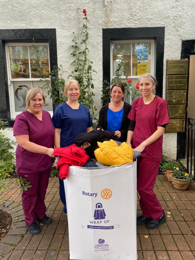 Cockermouth dental team collects coats for the homeless