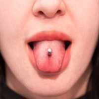 Dentists urged to warn patients of the dangers of oral piercings